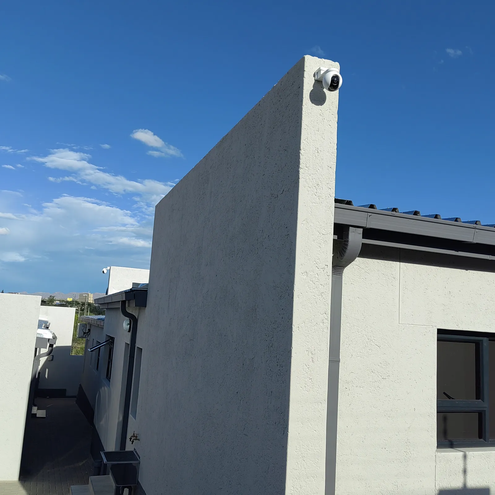 CCTV installation: EZVIZ camera covering a residential perimeter