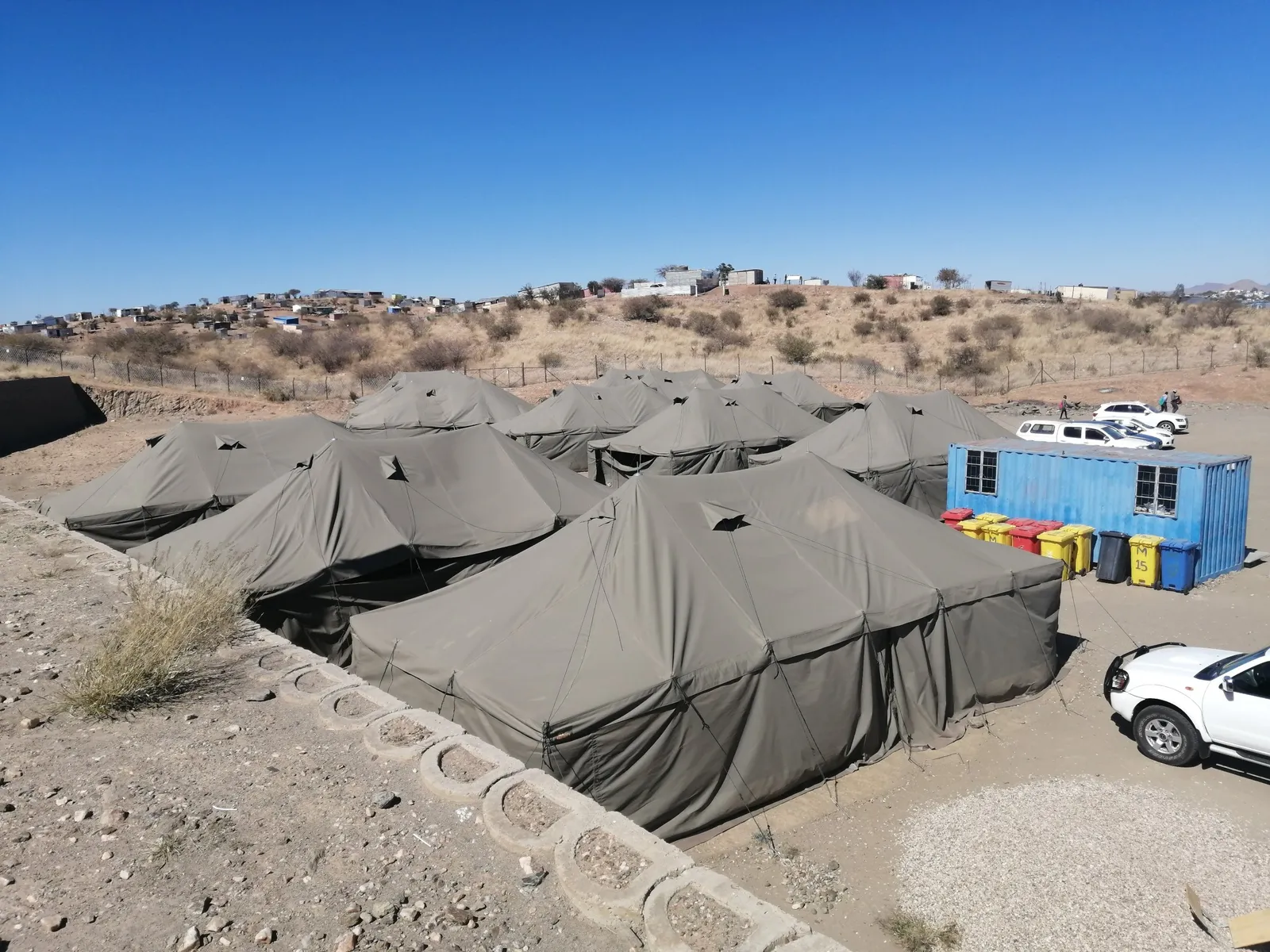 Havana Project School: before: Learners taught in tents, with no power